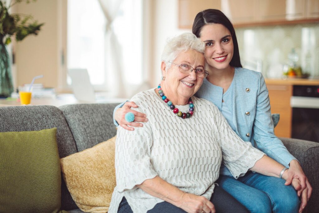 Social worker is visiting a senior woman